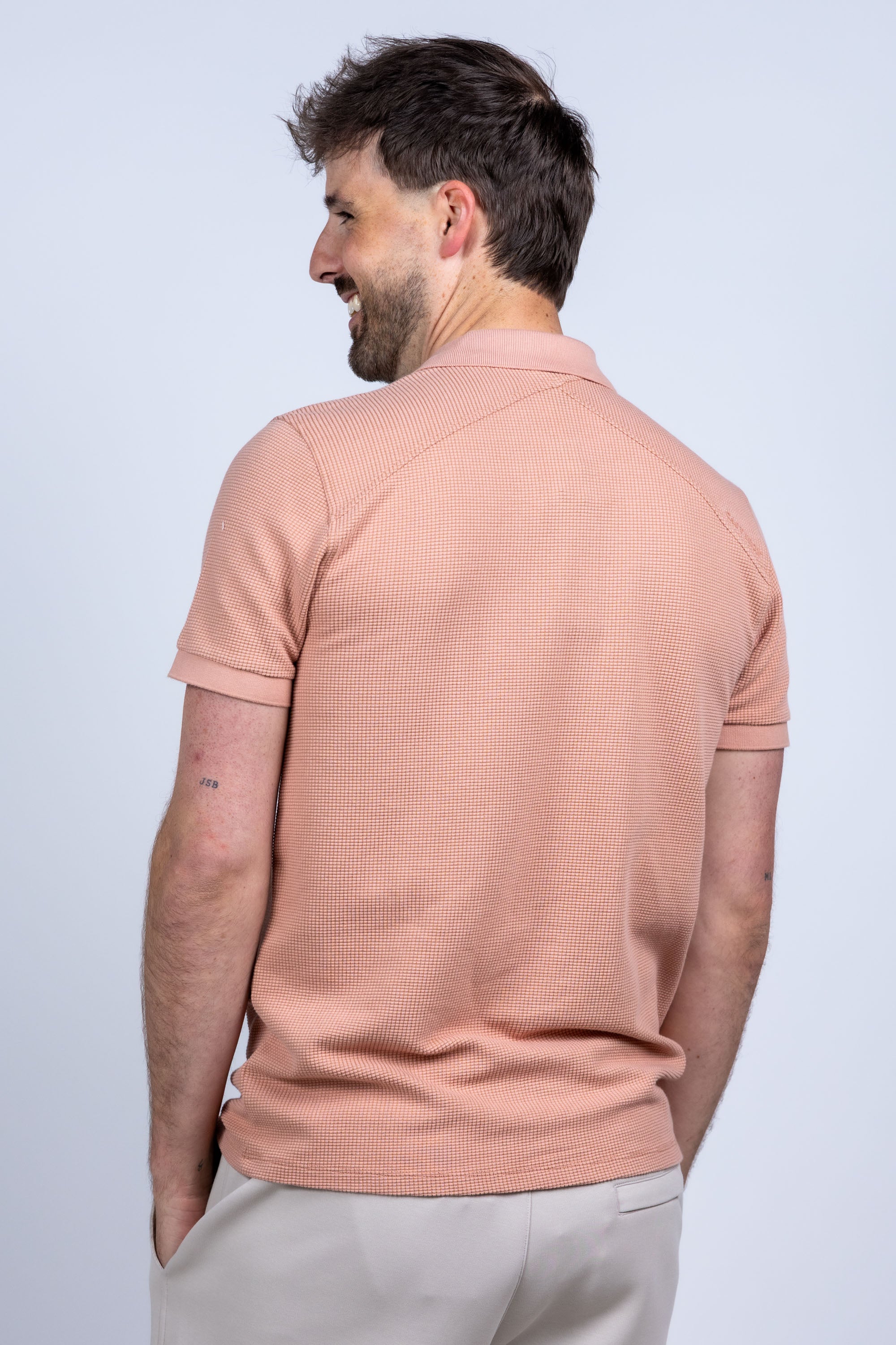 Polo met structuur - Pasteloranje